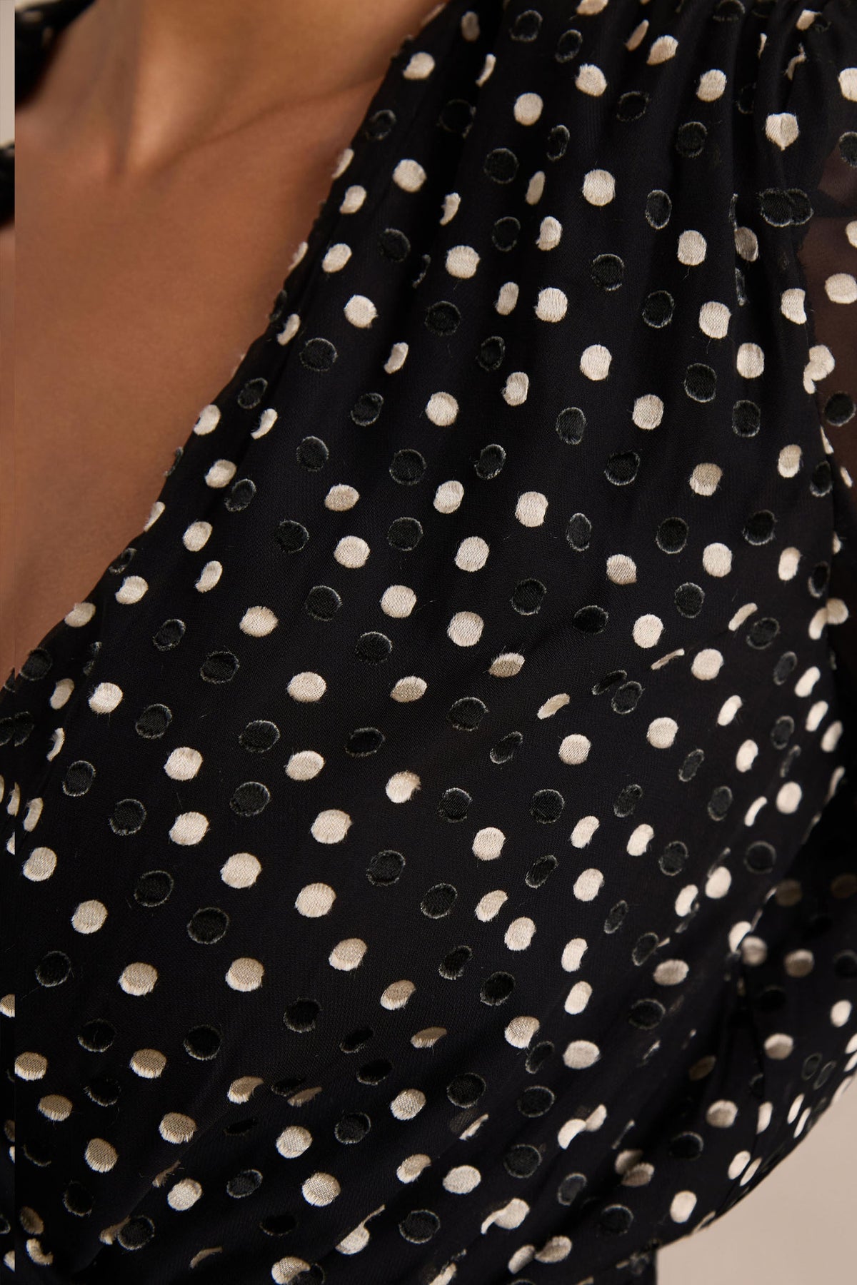 Mela | Black And White Polka Dot Plunge-Neck Mini Dress With Bell-Sleeves And Sash Detail